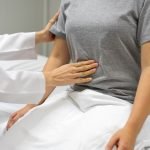 Female,Doctors,Are,Examining,By,Abdominal,Palpation,Of,Female,Patients